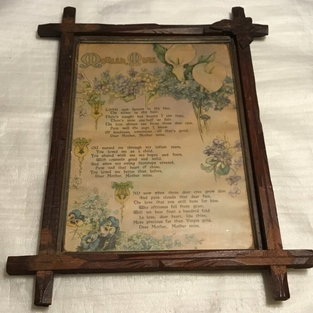 Antique Mother Mine watercolor like print framed behind glass tramp art frame